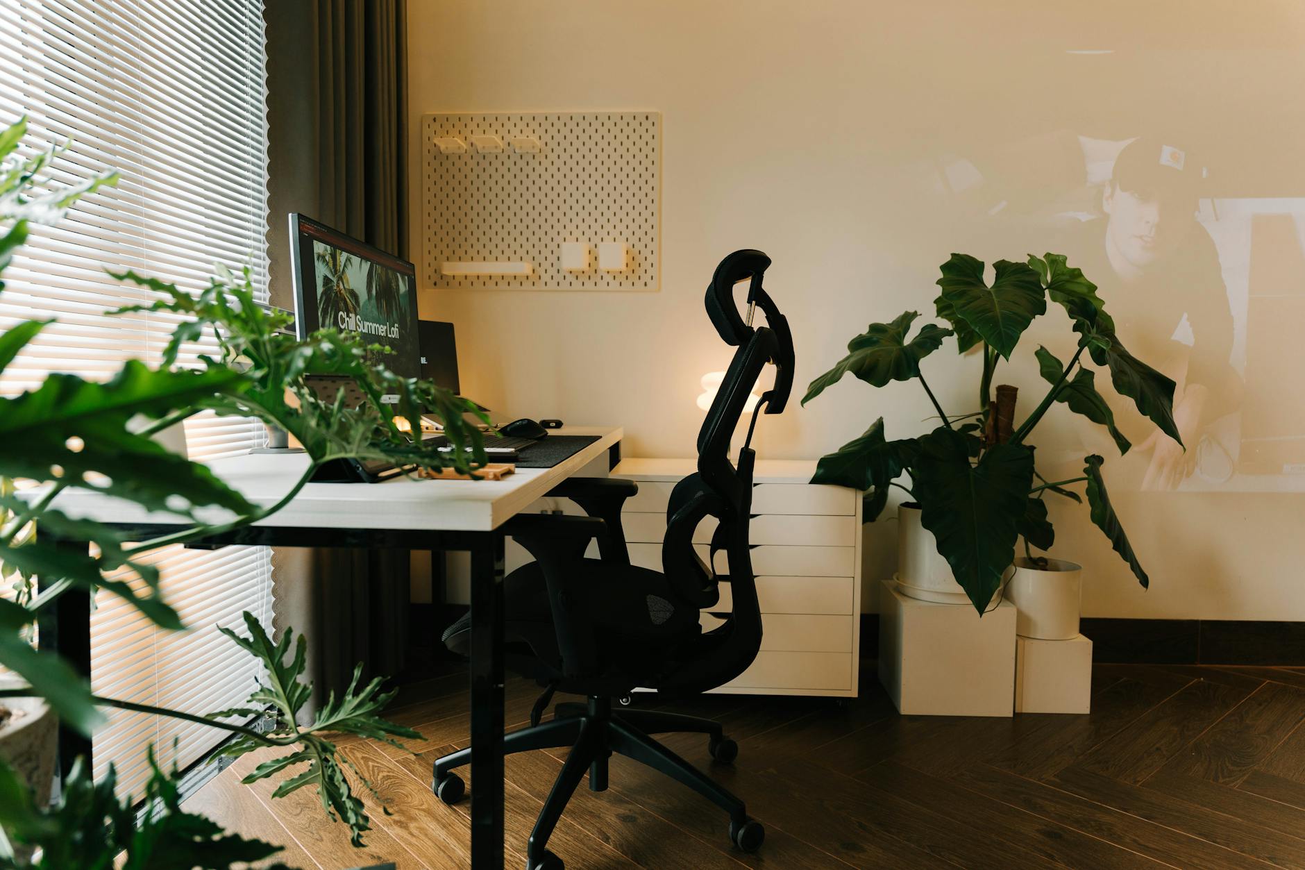 Clean home office workspace with laptop and minimal distractions on wooden desk