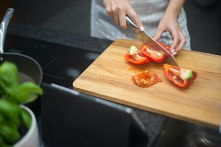 Why Tech Billionaires Are Hiring Professional Meal Planning Coaches Organized healthy meal preparation containers with fresh vegetables and proteins