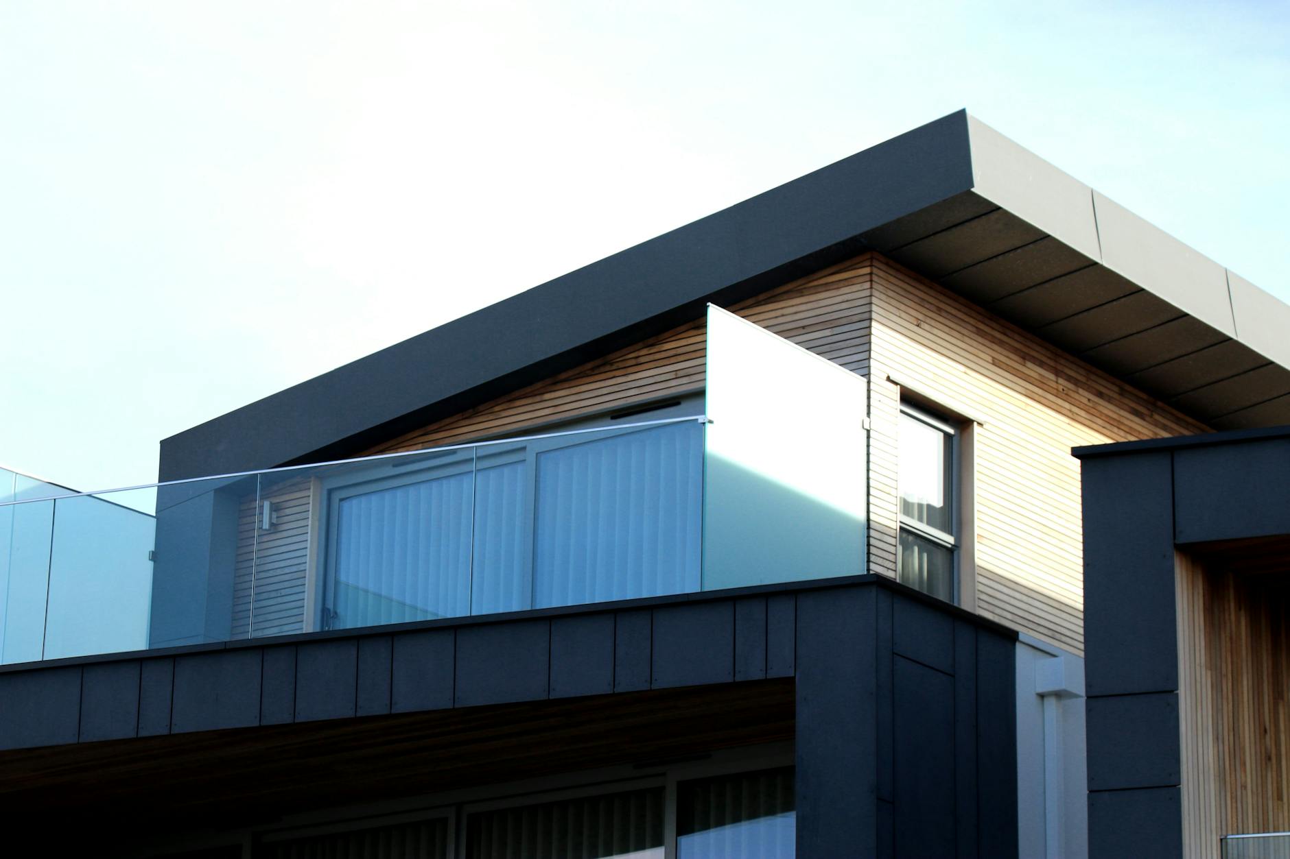 Contemporary multi-level home with separate entrances and connected design elements