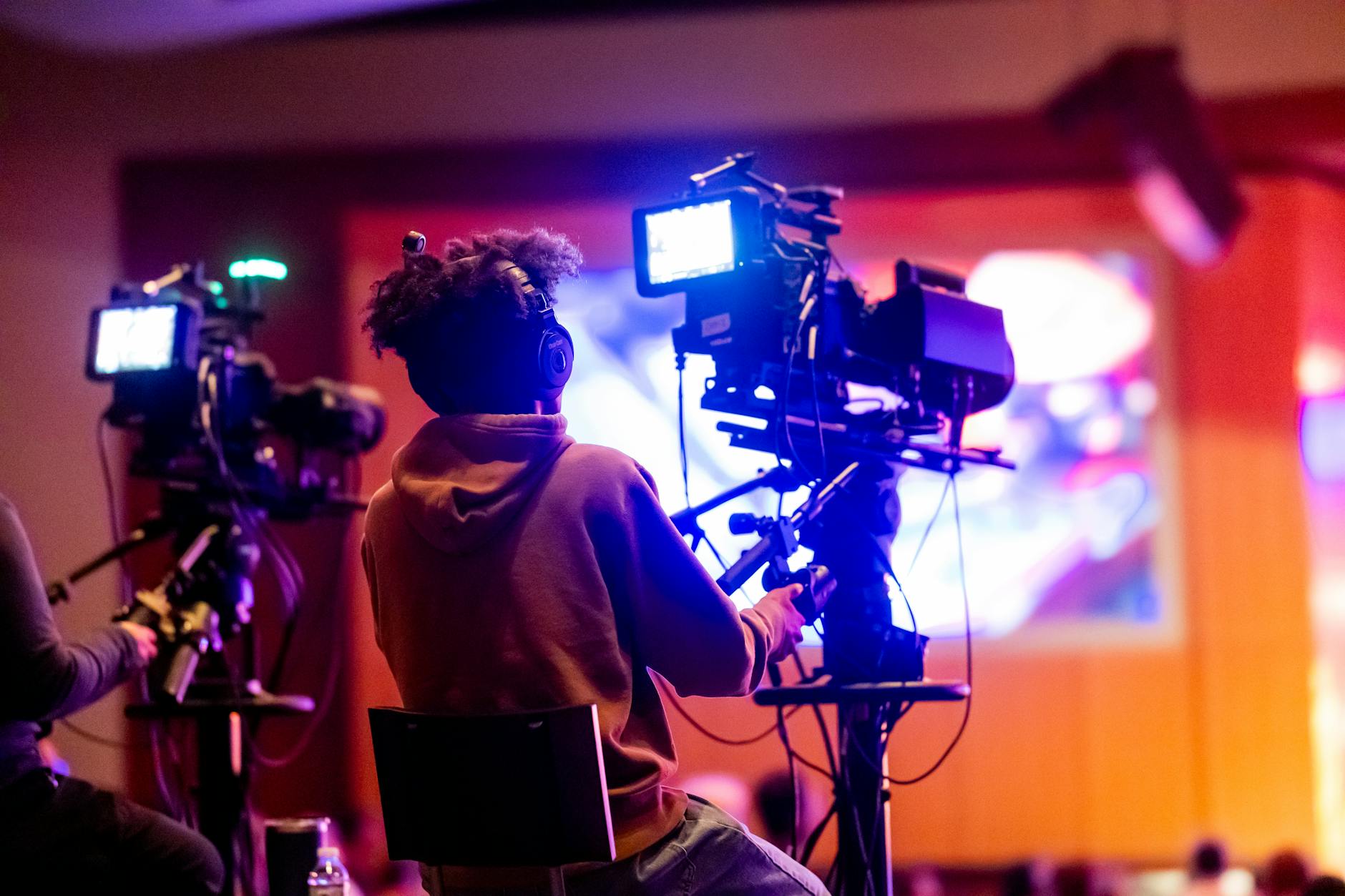 Professional television production set with cameras and lighting equipment