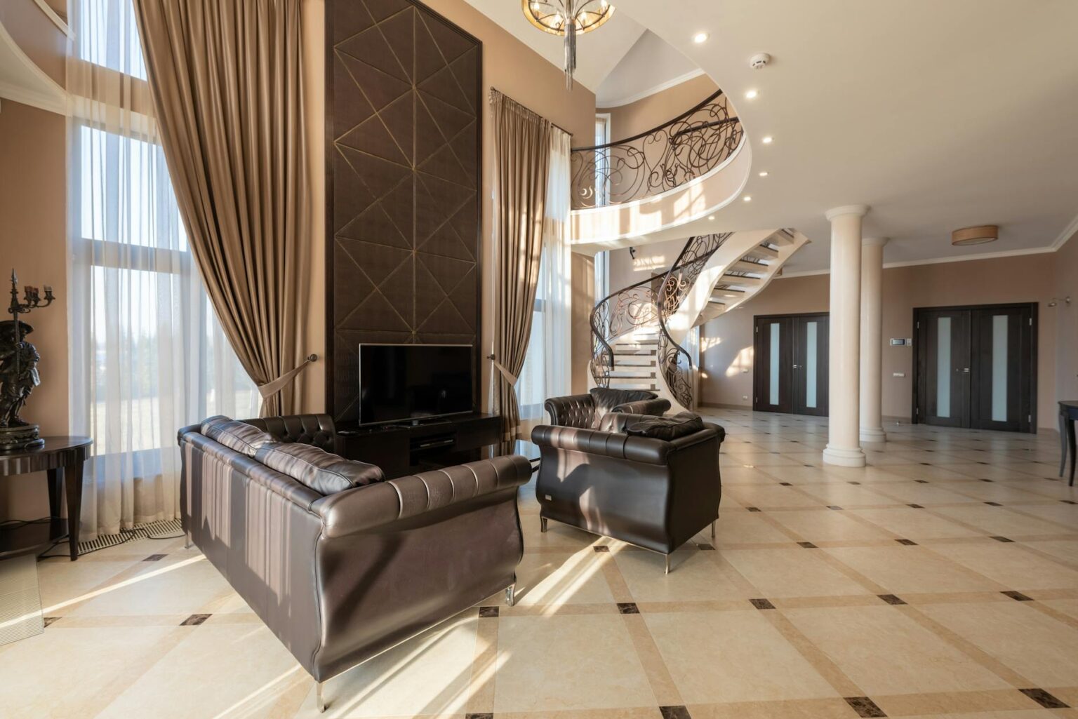 Elegant luxury home interior with marble surfaces and modern lighting fixtures