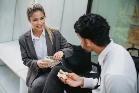 The Rise of Professional Meal Planners for Busy Executives Professional business meeting with healthy lunch spread on conference table