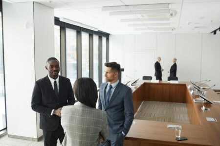 Why Tech CEOs Are Hiring Professional Friendship Coaches Professional business meeting in modern office setting
