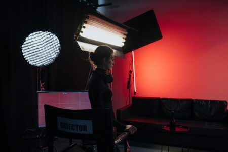 How Jennifer Lawrence’s Production Company Is Changing Female-Led Action Films Movie production equipment and crew working on a film set