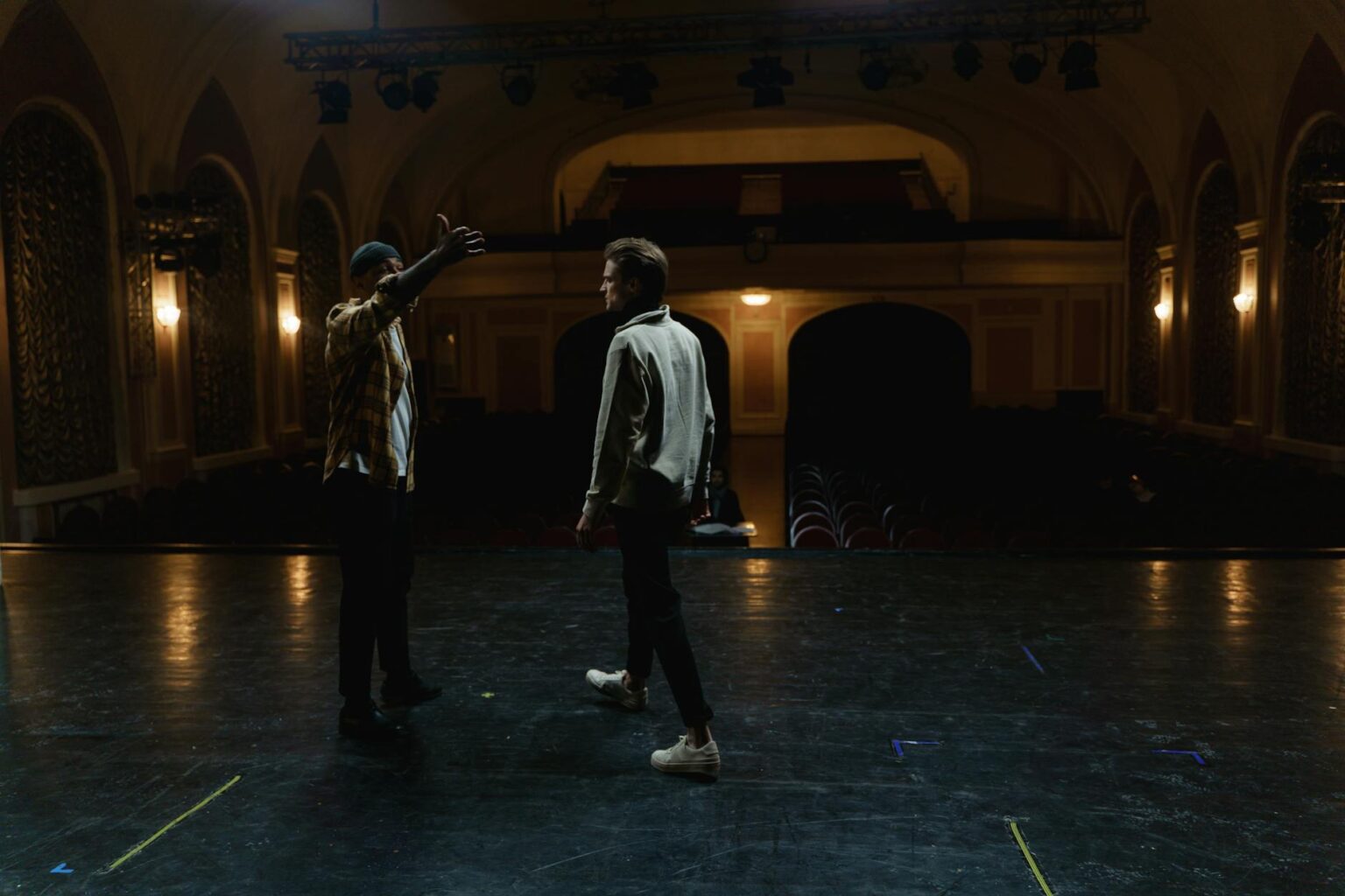 How Broadway Is Using Augmented Reality To Enhance Live Performances Broadway theater stage illuminated with professional lighting system and empty red velvet seats