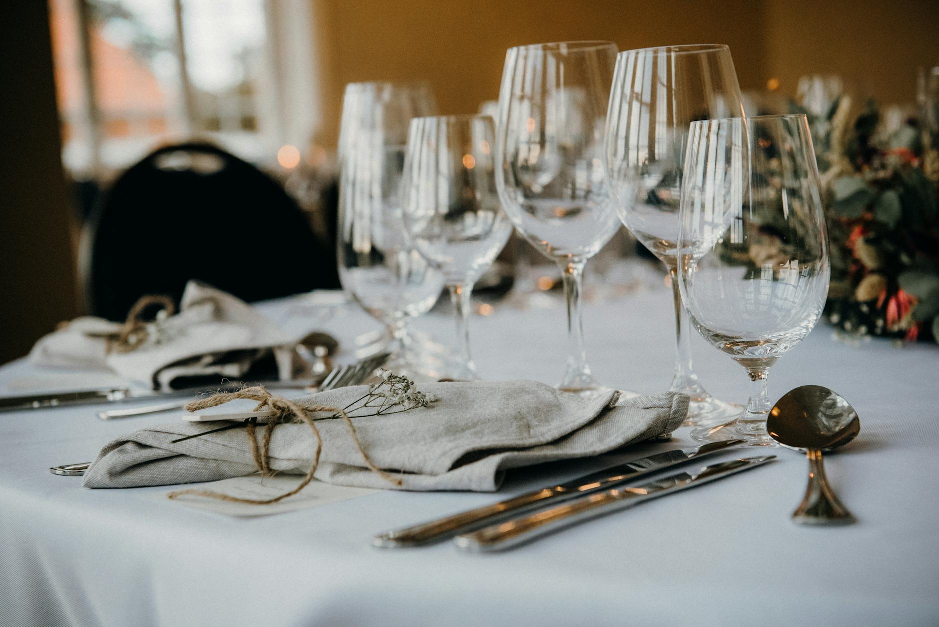 Beautifully set dinner table with fine dining presentation
