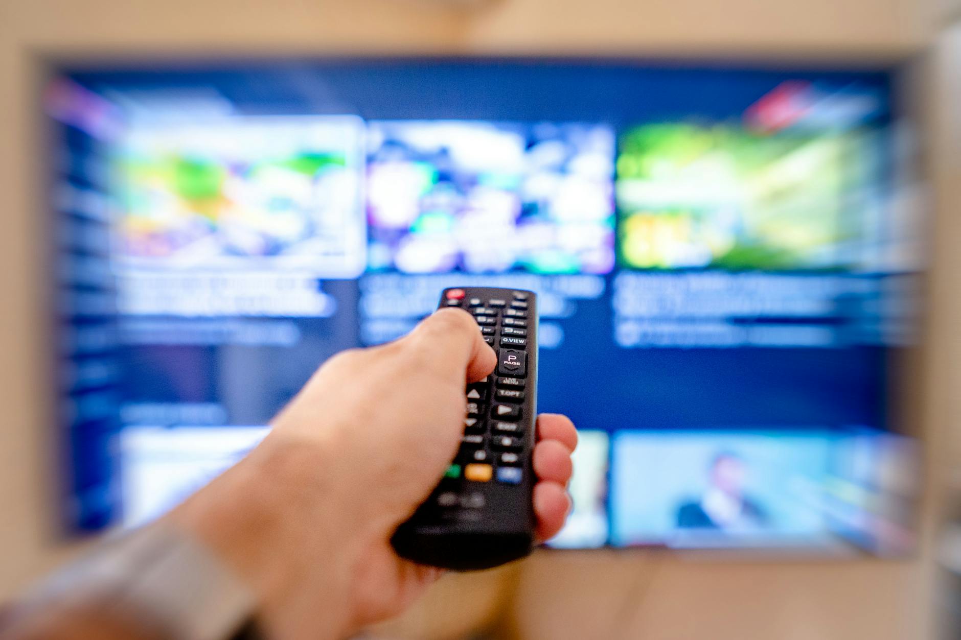 Modern living room with large TV displaying streaming service interface