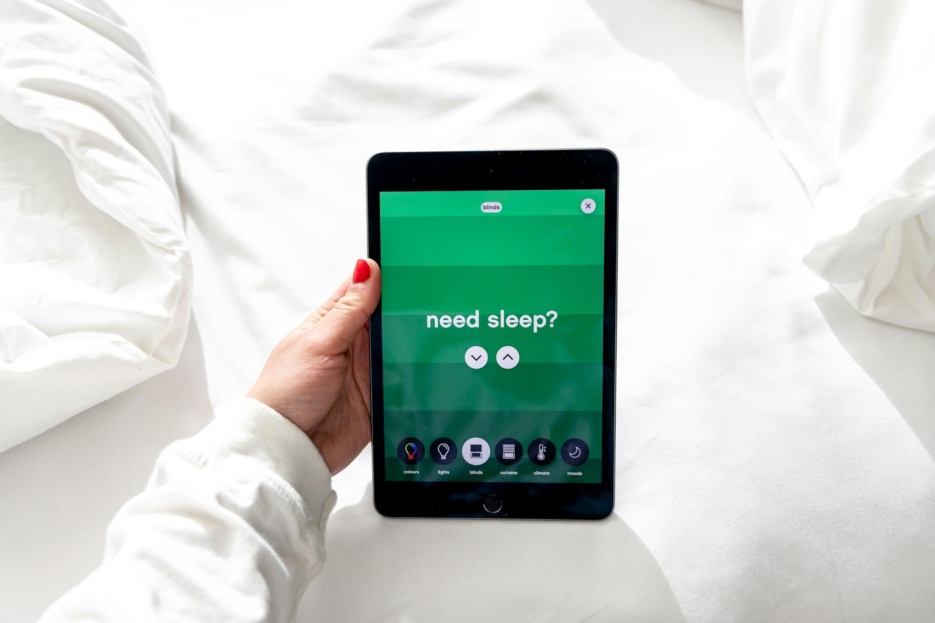 Modern sleep monitoring device and smartphone showing sleep tracking data