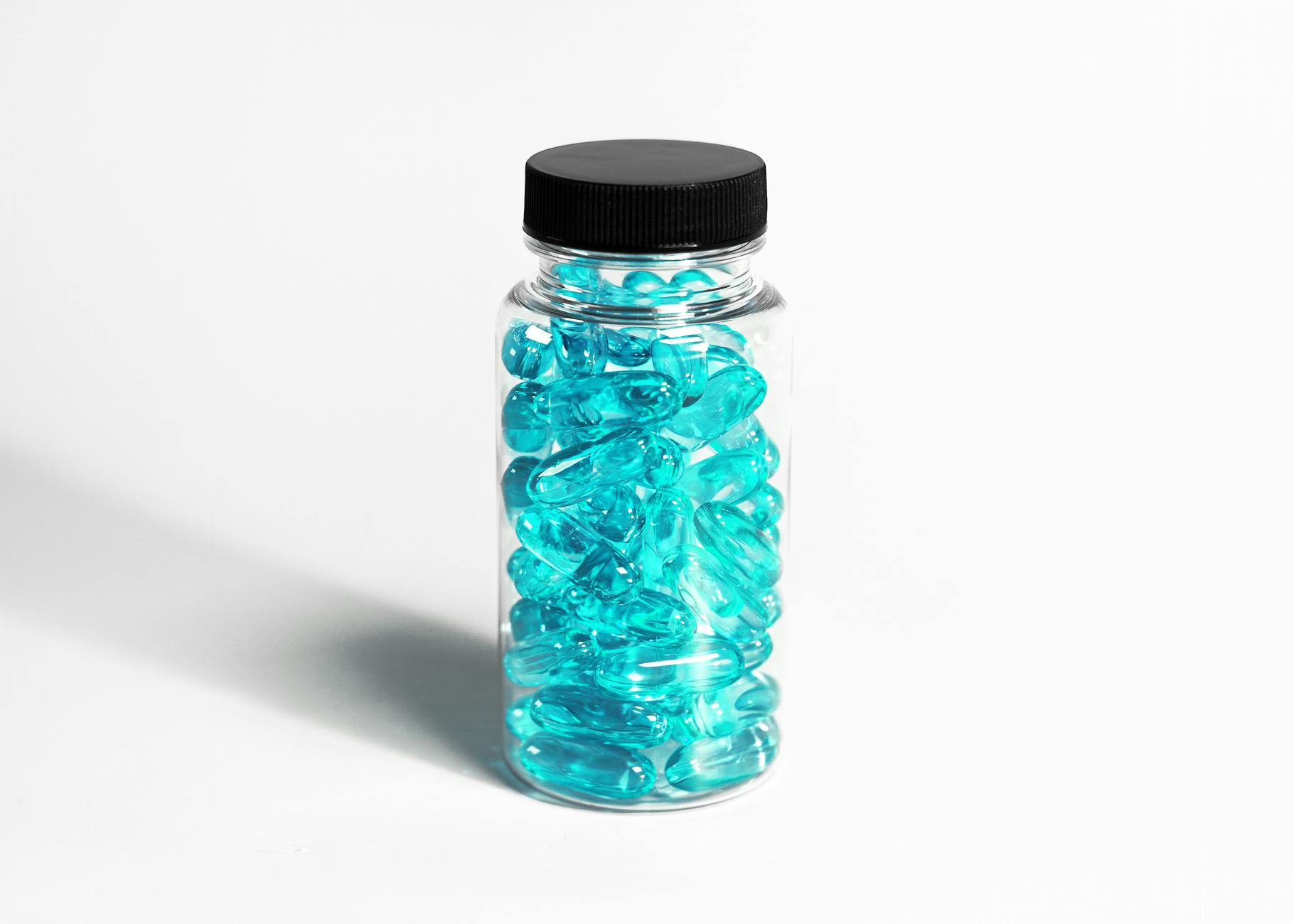 Supplement bottles and capsules in a clean laboratory setting