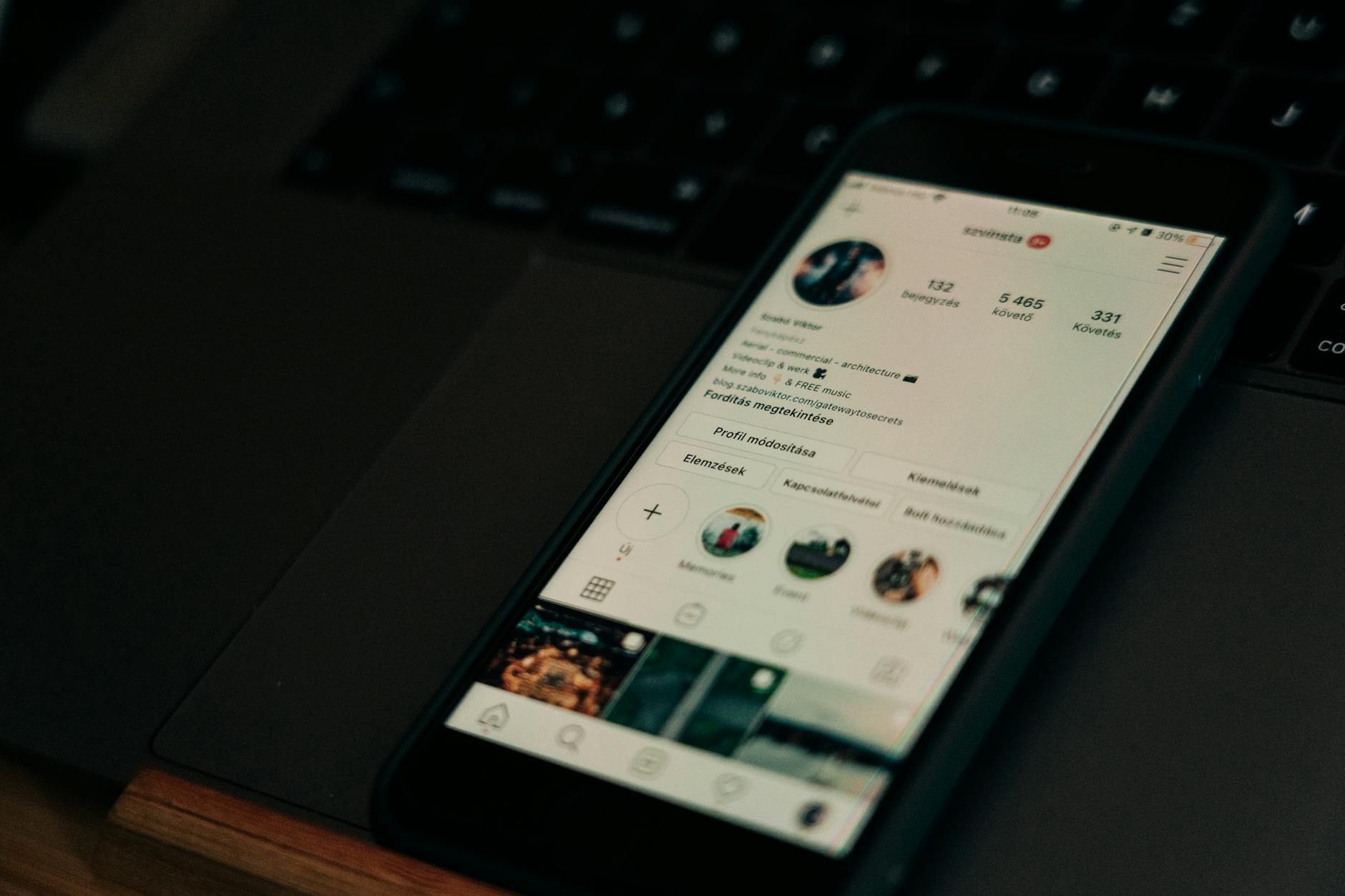 Person using smartphone showing social media app interface