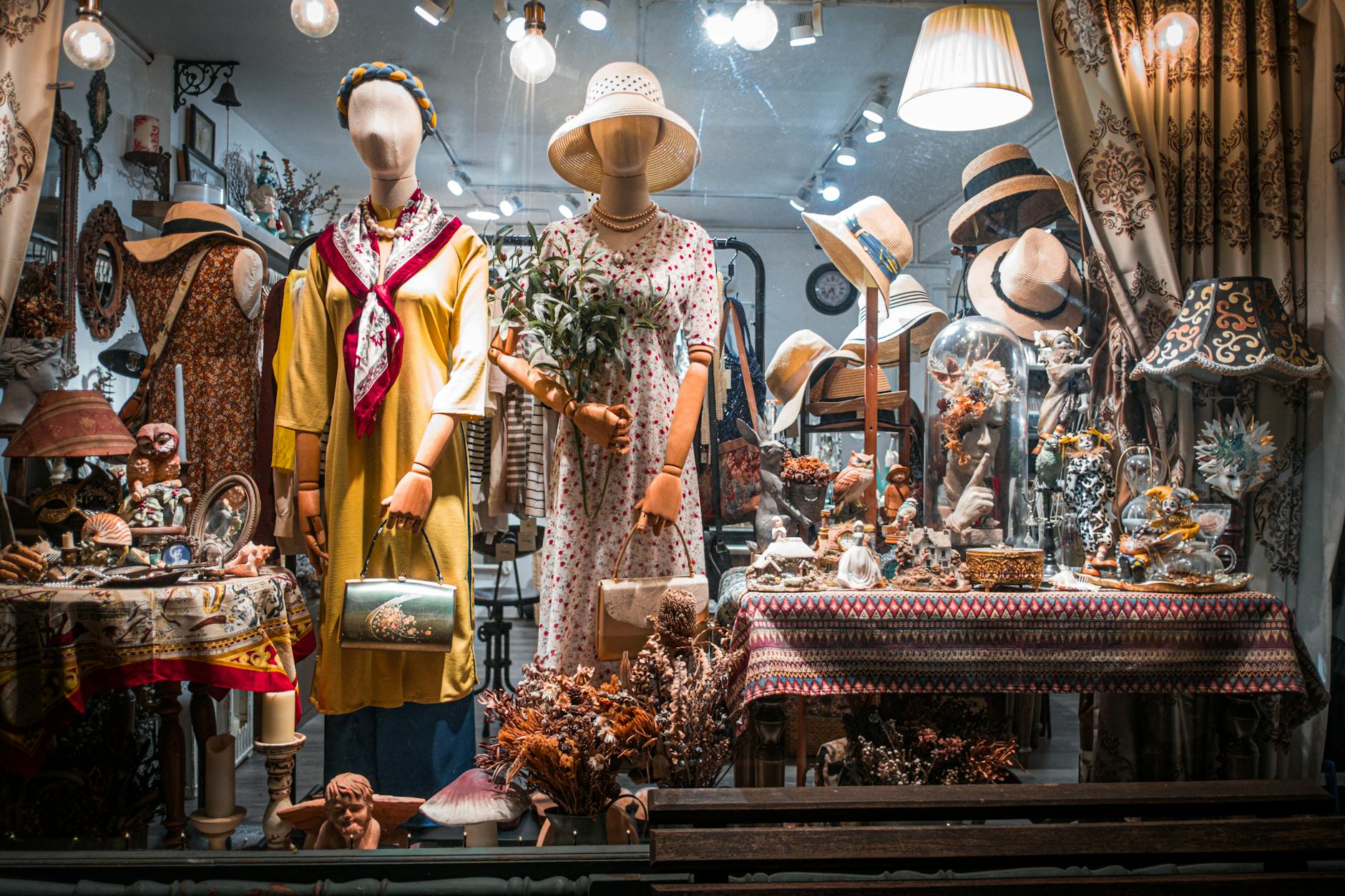 Vintage clothing items displayed on hangers showcasing retro fashion pieces and accessories