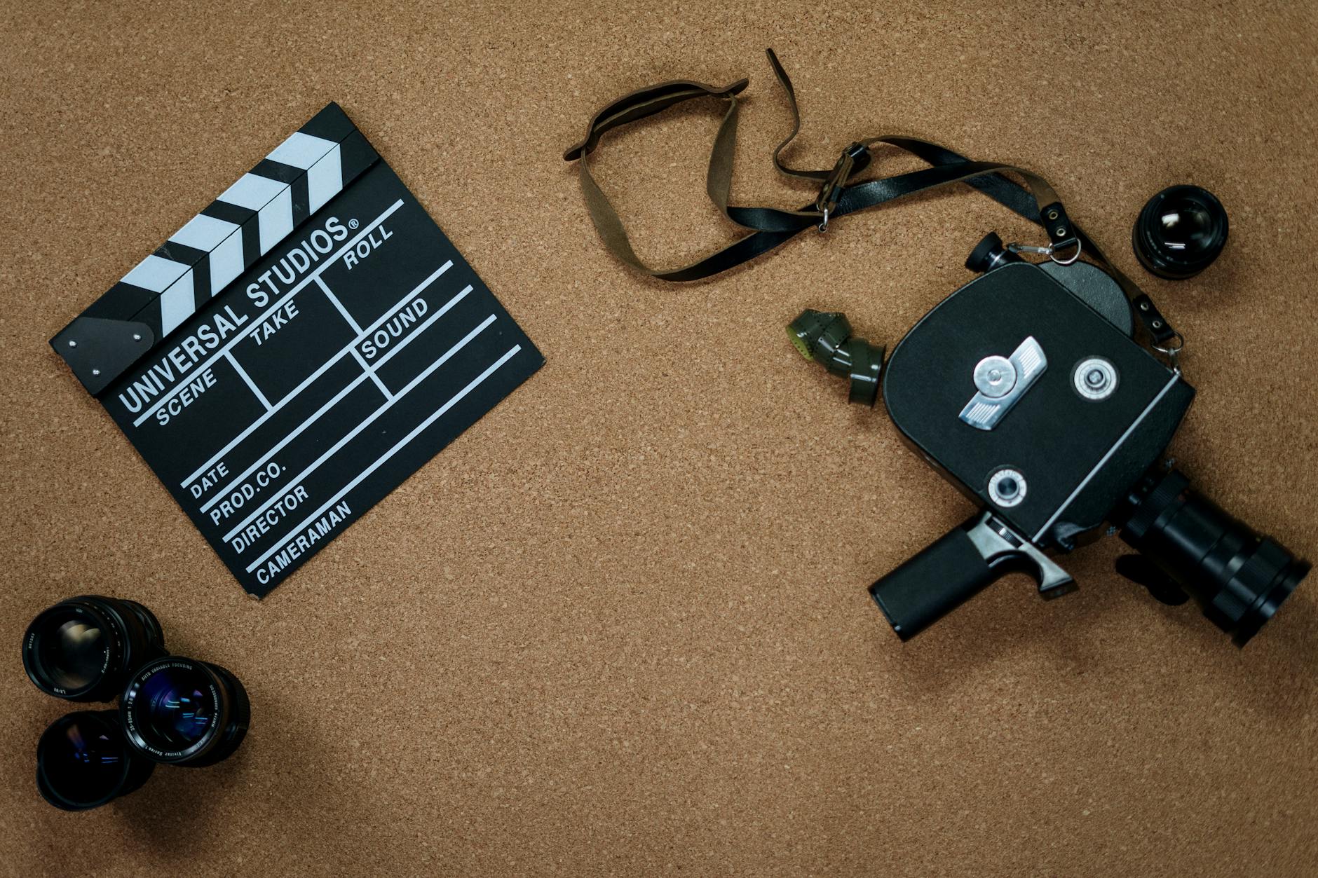 Film crew working with cameras and lighting equipment on movie set