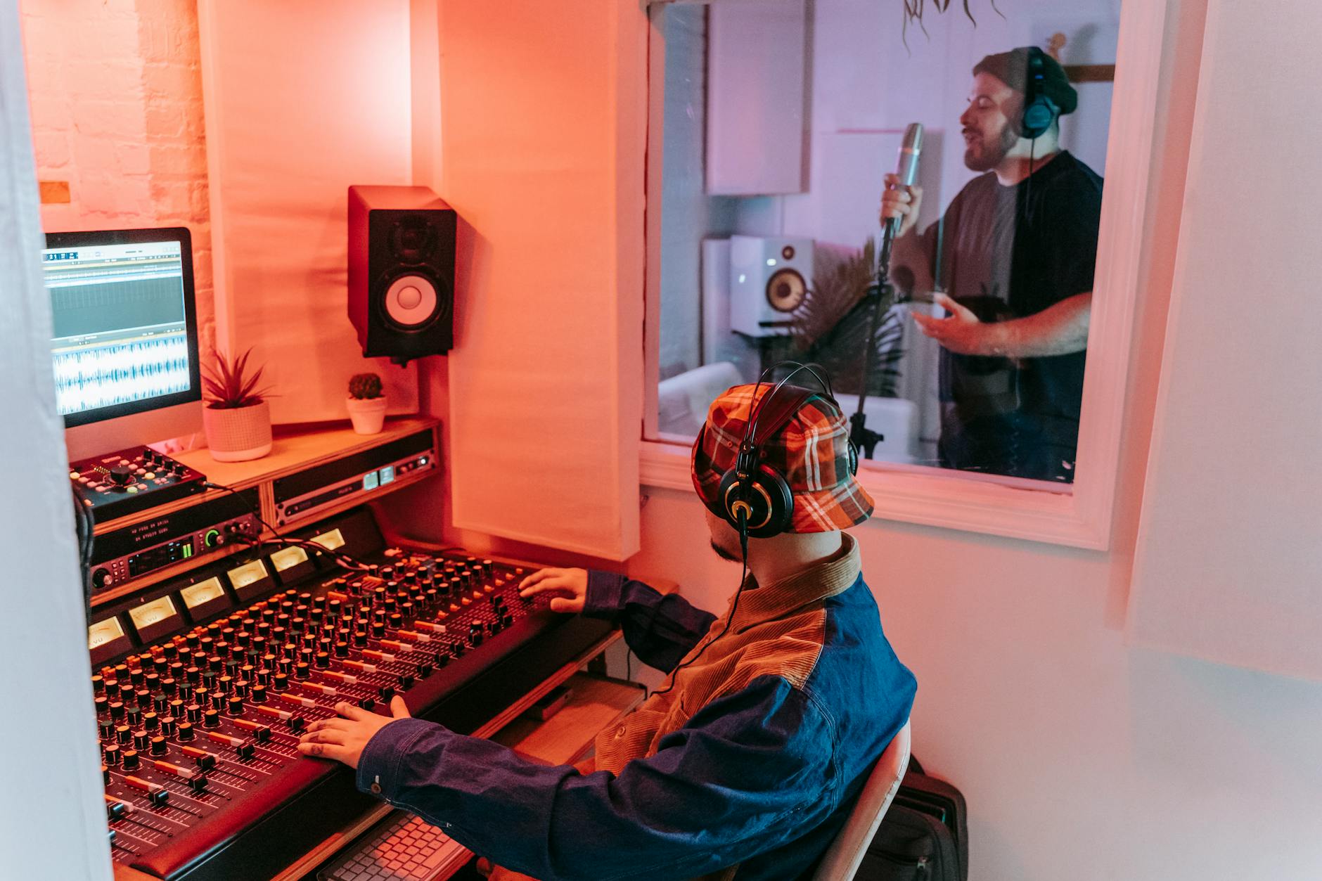 Professional recording studio equipment with mixing board and monitors for music production