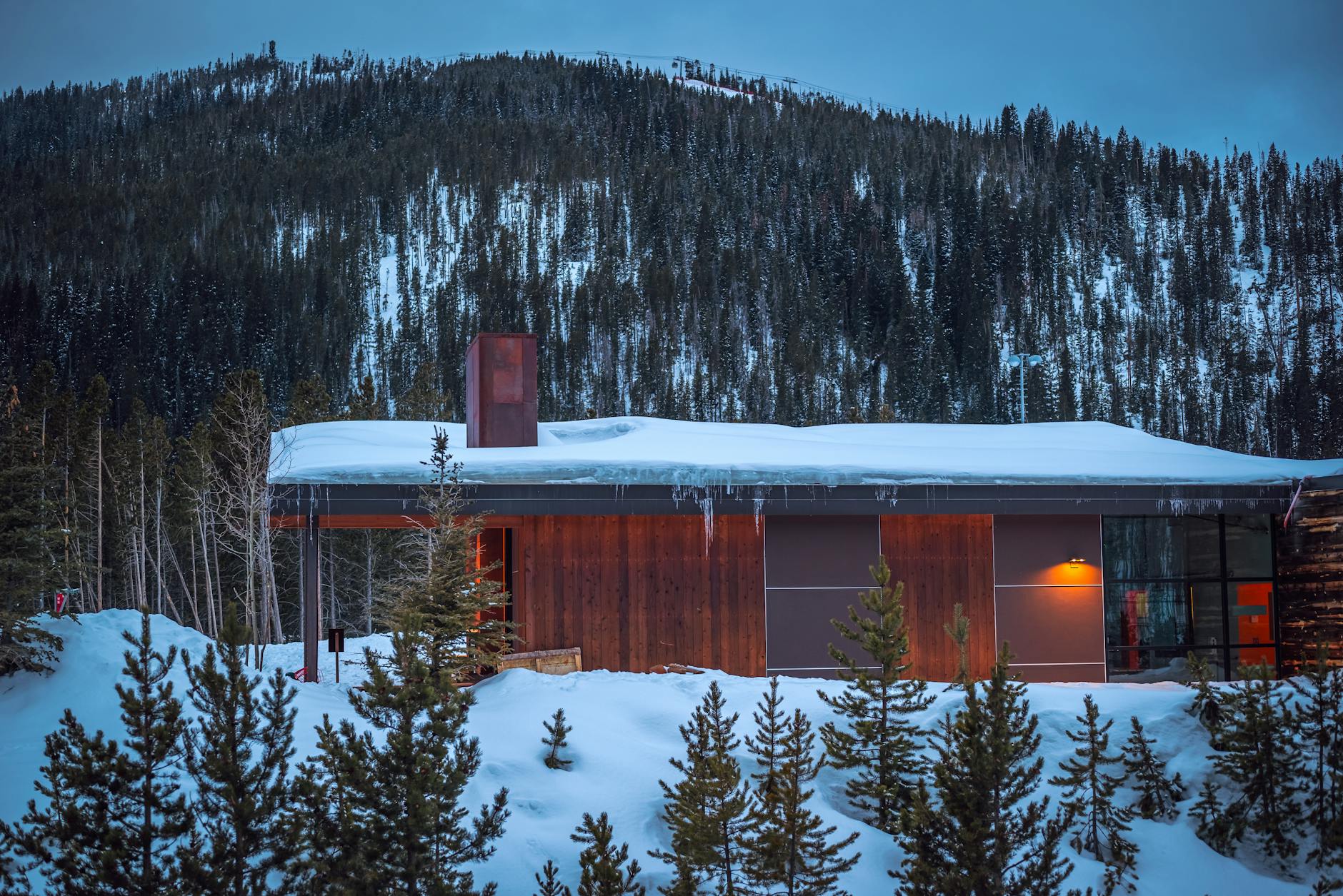 Peaceful mountain wellness center with natural stone architecture and scenic views