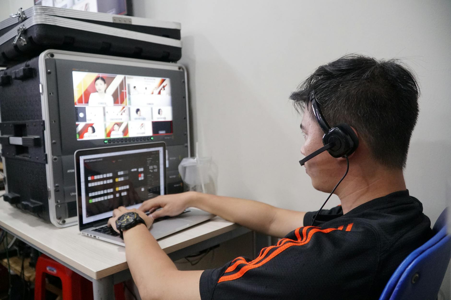 Live streaming broadcast setup with monitors and professional broadcasting equipment