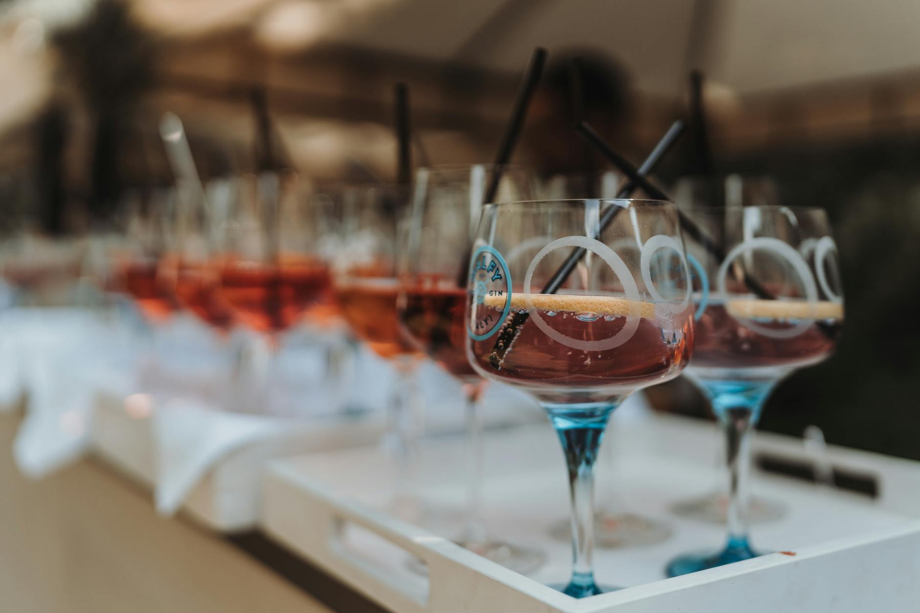 Elegant cocktail glasses raised in celebration of business success