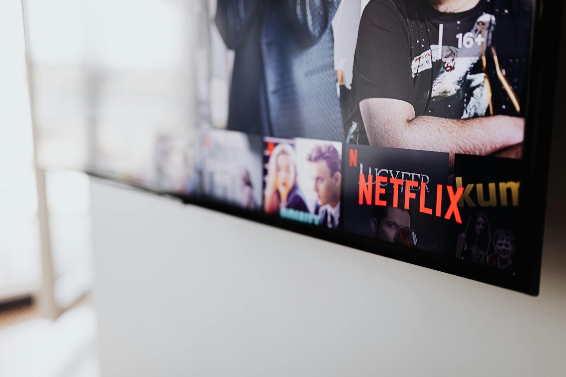 Person using streaming service on tablet device
