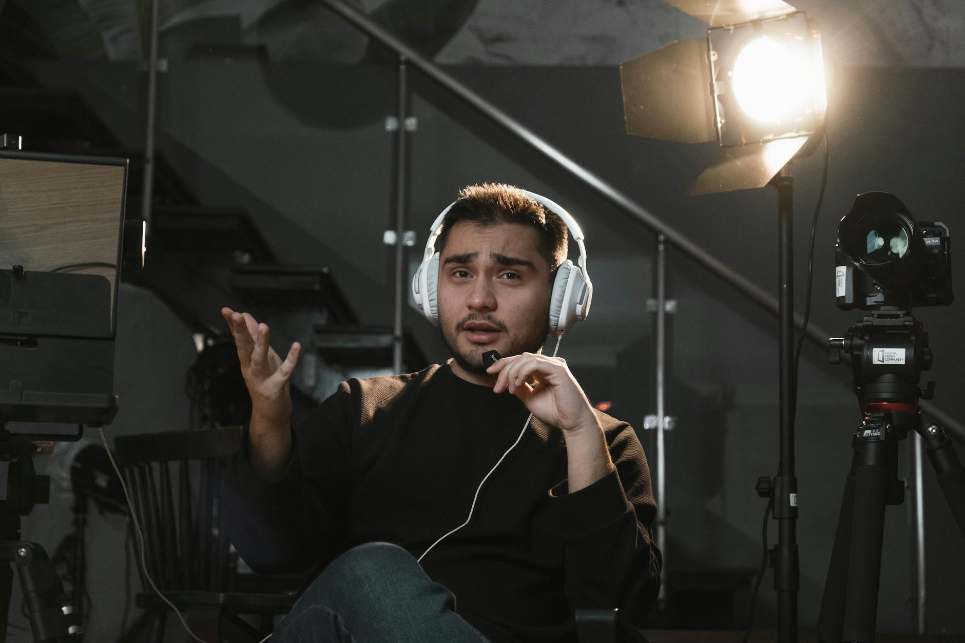 Modern streaming studio with professional lighting, cameras, and broadcast equipment setup