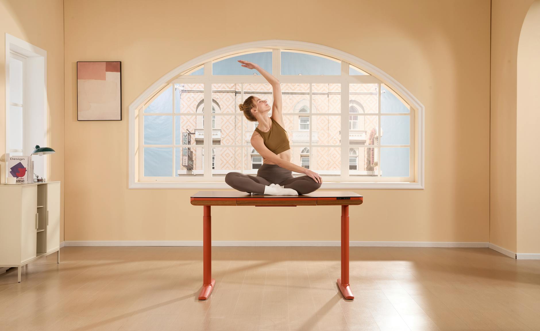 Professional woman practicing desk stretches in a modern office environment
