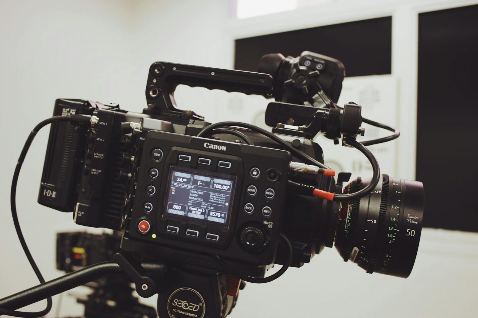 Professional film camera and lighting equipment on movie set