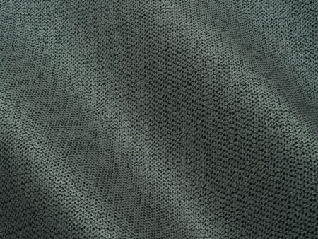Close-up of intricately woven leather strips showing detailed lattice texture