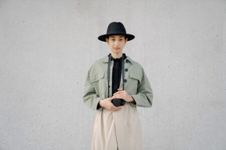 A minimalist luxury outfit laid flat, showing clean tailoring and neutral tones