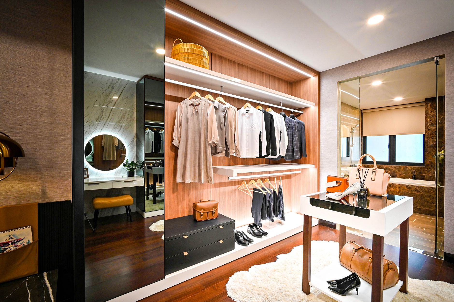 Neatly arranged high-end clothing pieces in a sophisticated wardrobe setting