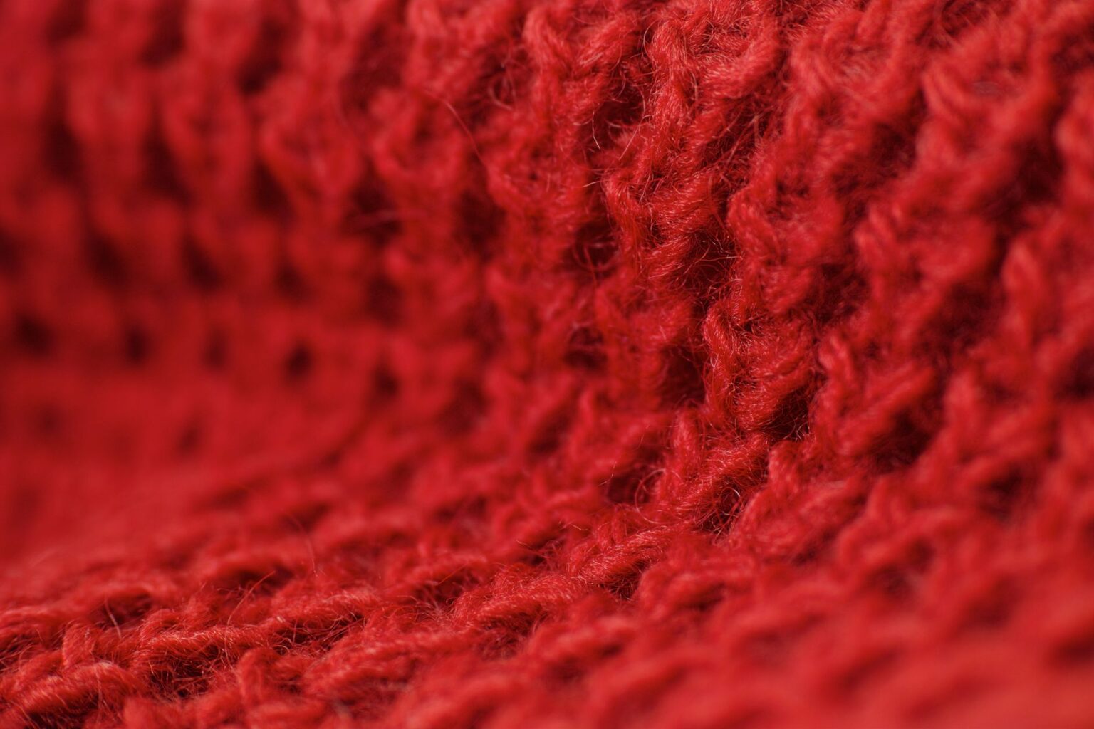 Close-up of a fuzzy mohair knit sweater showing soft halo fiber texture