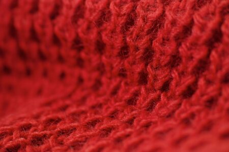 Close-up of a fuzzy mohair knit sweater showing soft halo fiber texture