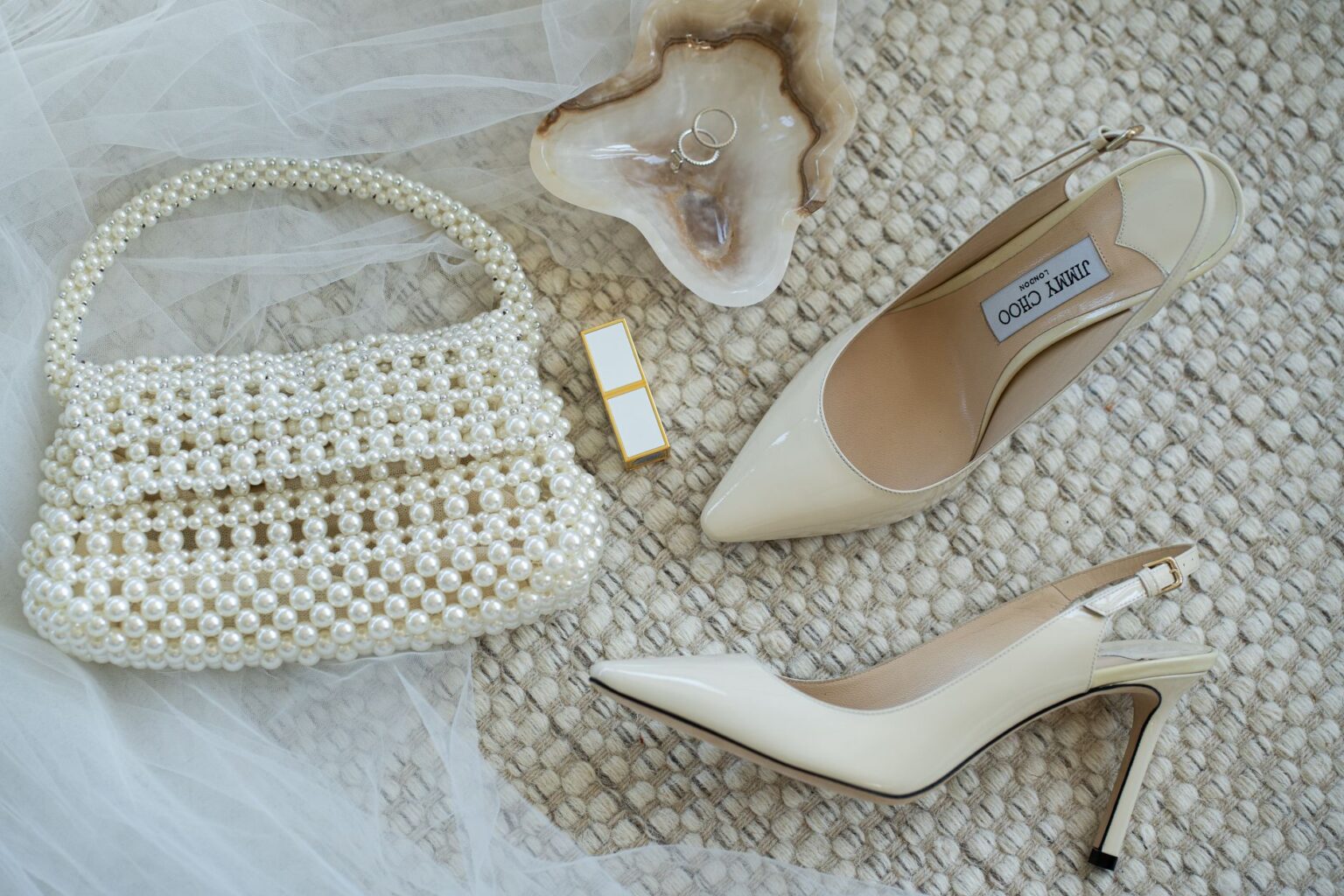 The Slingback Is Quietly Reclaiming the Pump’s Dominance Close-up of a pair of classic slingback heels on a neutral background