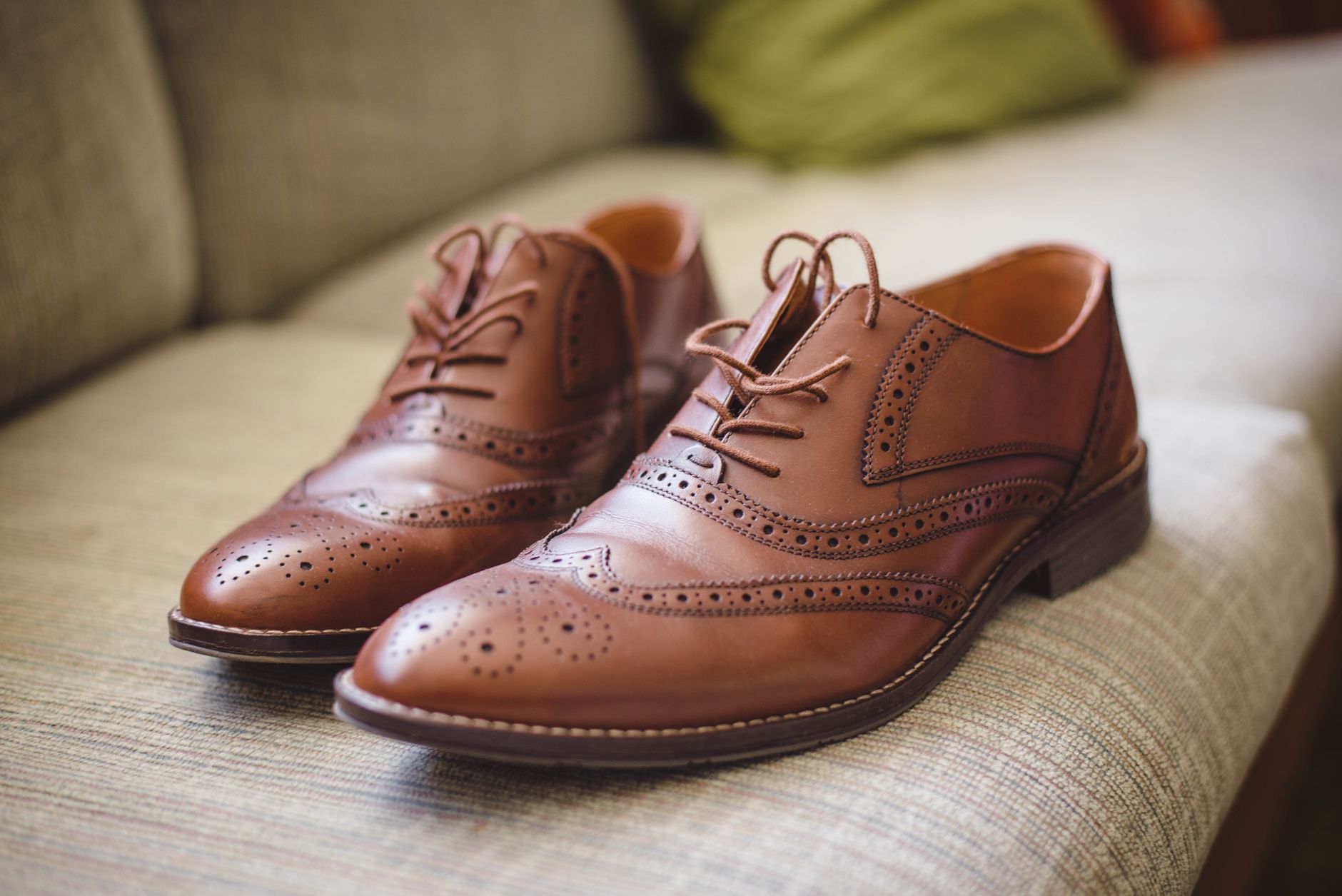 Detail shot of high-quality leather footwear showing stitching and material texture