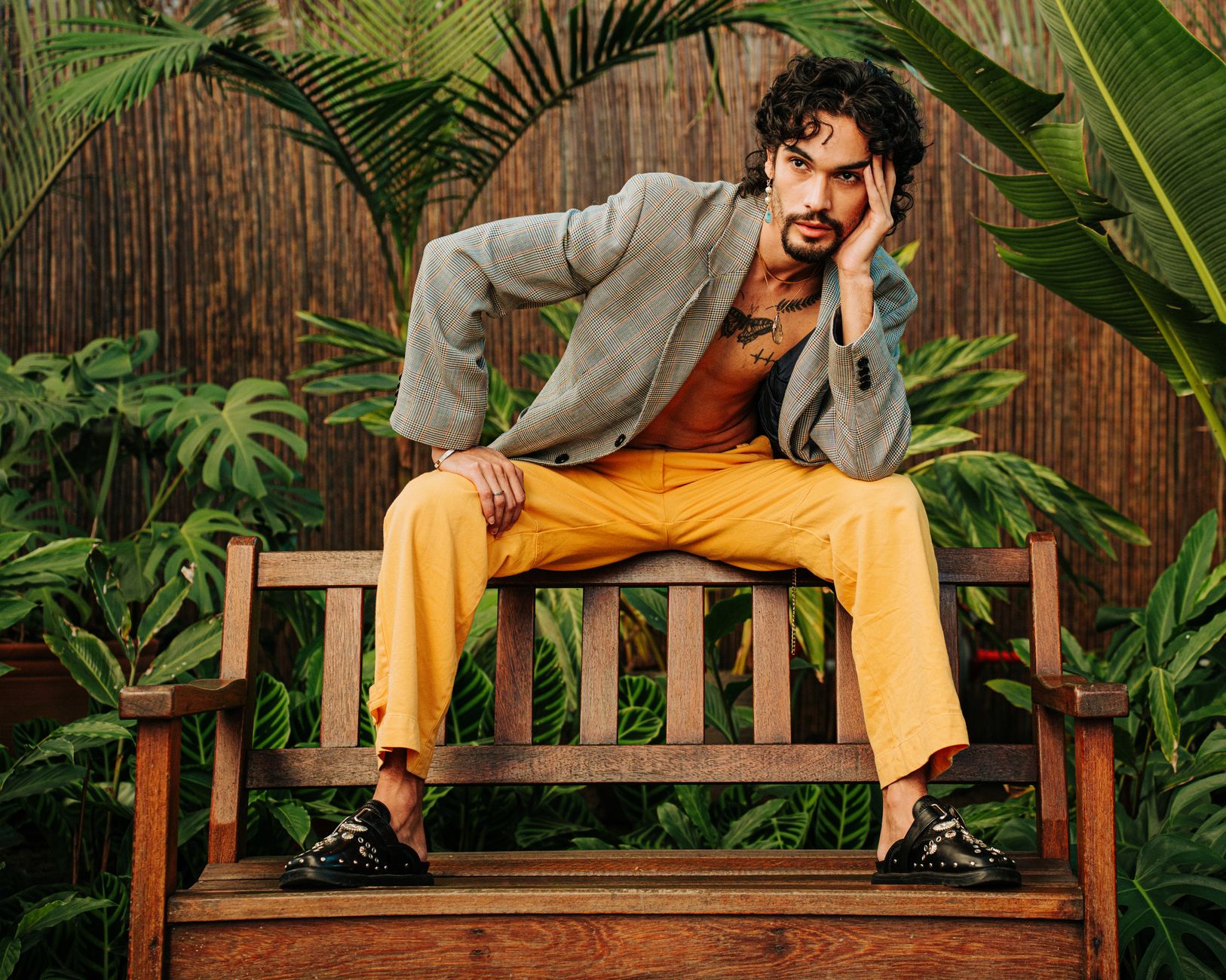 Editorial-style image of structured footwear styled with minimal clothing