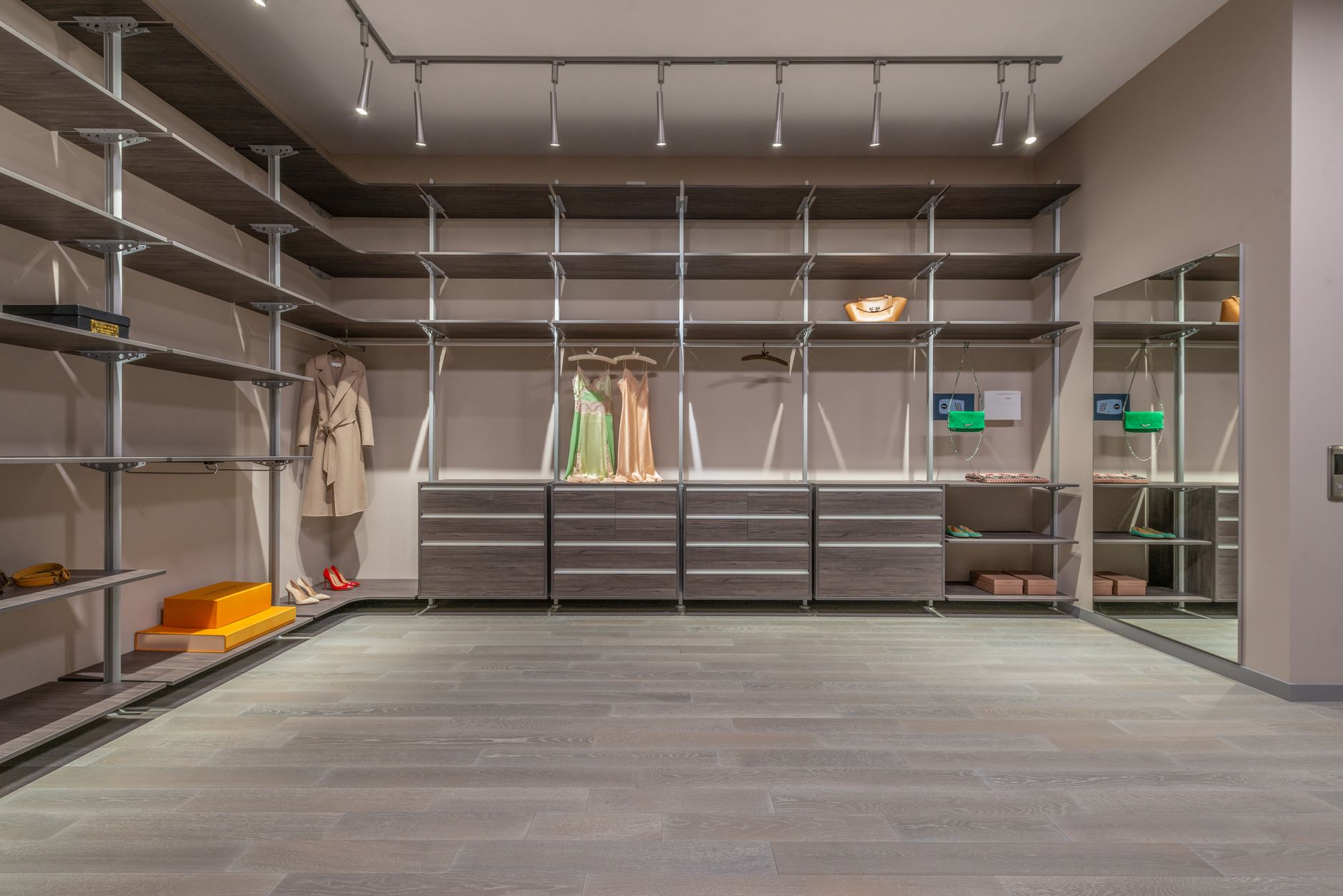 Curated selection of high-end vintage garments displayed on a boutique clothing rack
