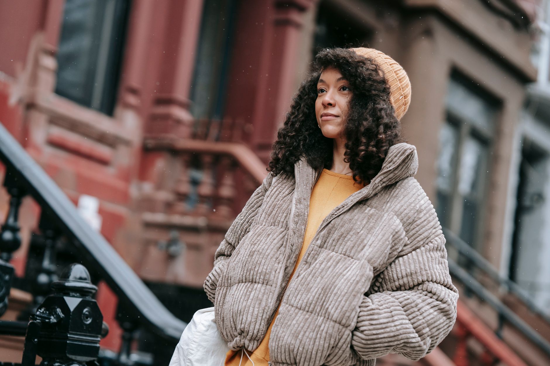 Street style shot of a person in a tailored coat during winter fashion week