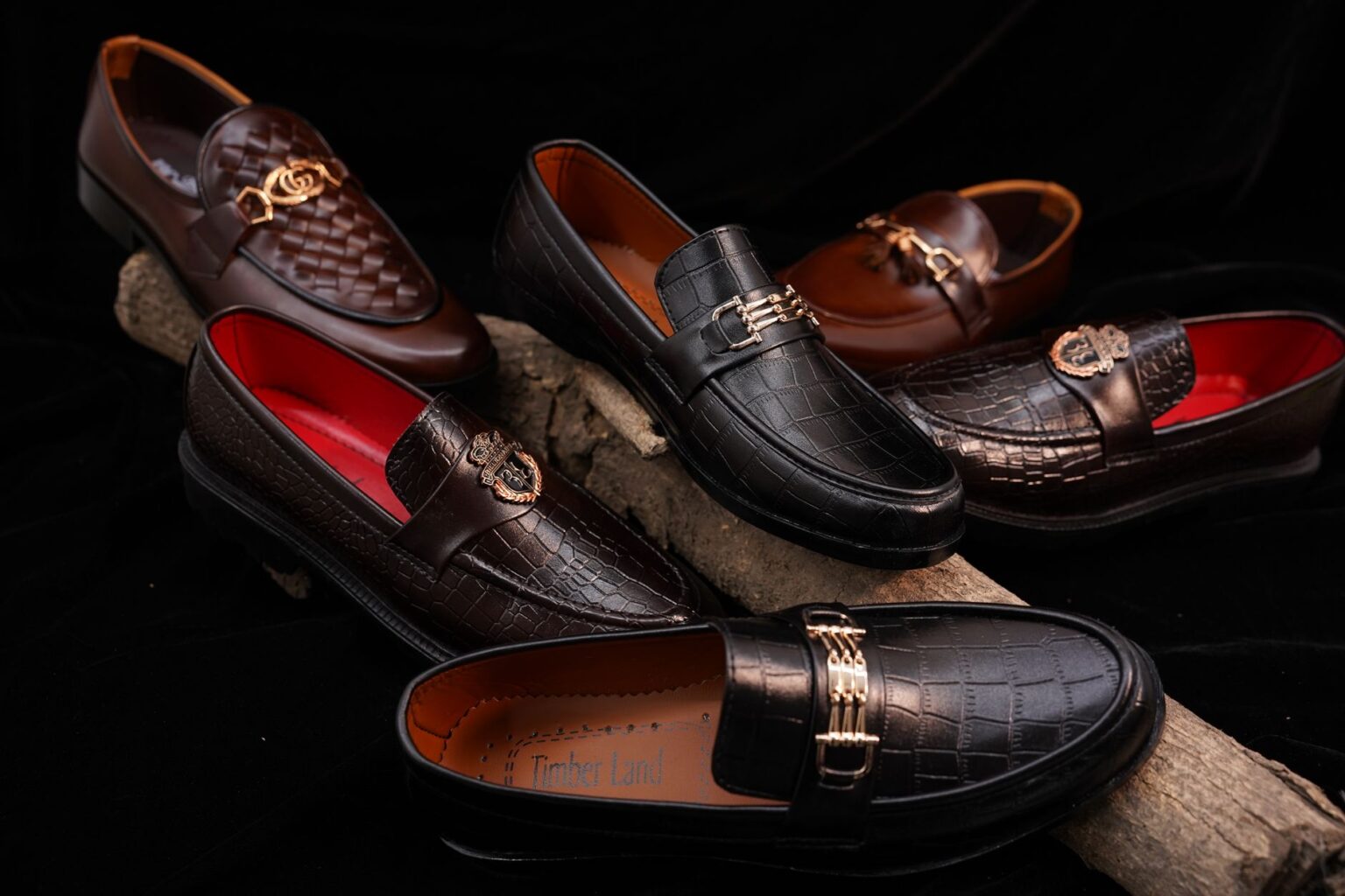 A single minimalist leather loafer on a clean surface, viewed from above