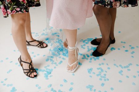 Close-up of a kitten heel sandal on a light background