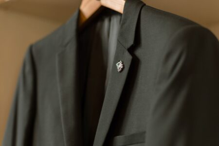 Close-up of exposed seam construction on a tailored blazer jacket