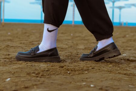 The Slip-On Loafer Is Quietly Edging Out the Lug-Sole Boot A pair of polished leather slip-on loafers on a clean surface