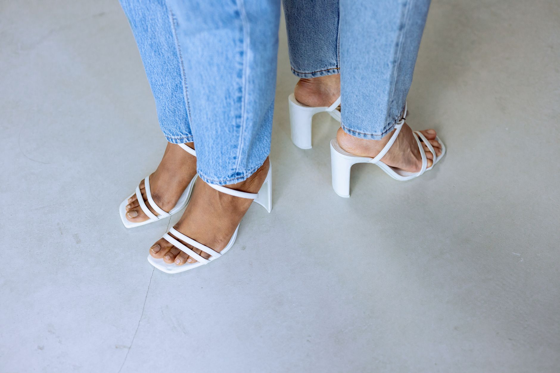 Stylish sandals styled with warm weather summer outfits